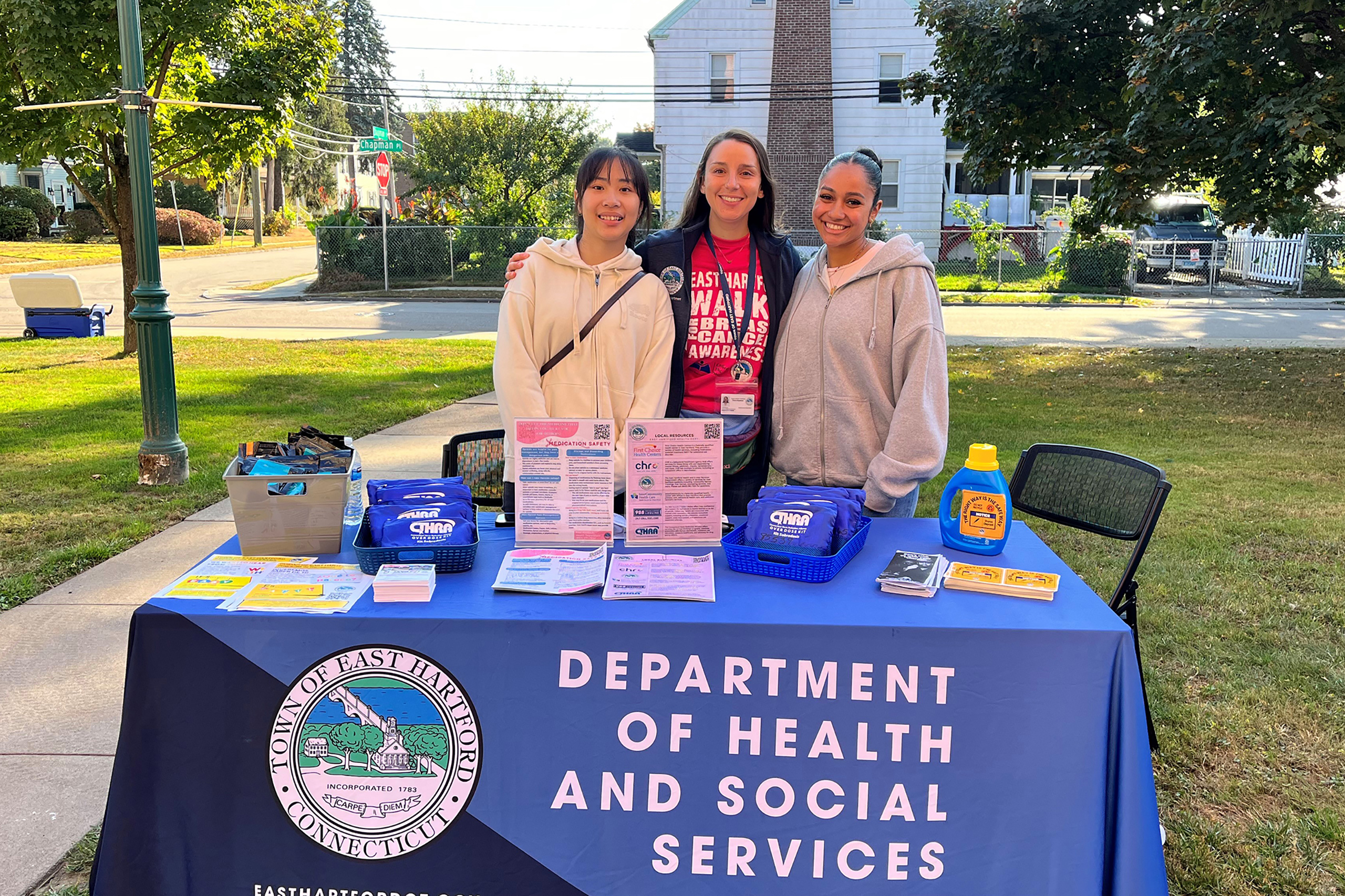 group of allied health student at their health and social services booth in east hartford